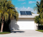Picture of a Cocoa Beach home with a solar thermal system on the roof.