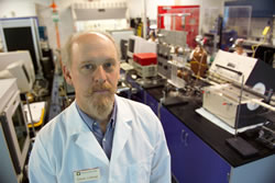 Photo of researcher in hydrogen lab.